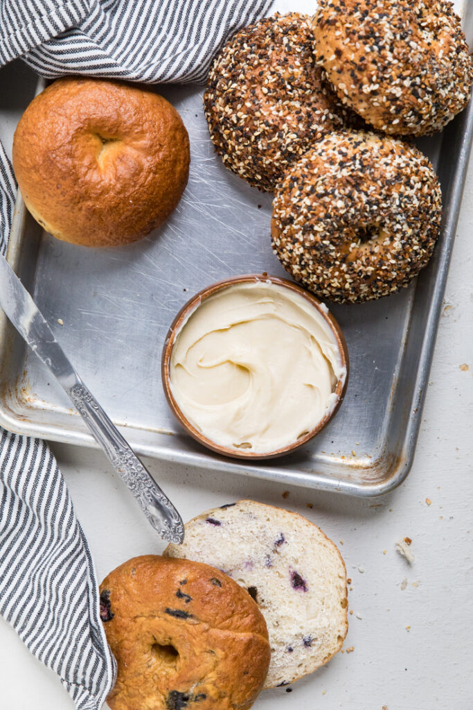 A bowl of vegan nut free soy free cream cheese with bagels. 