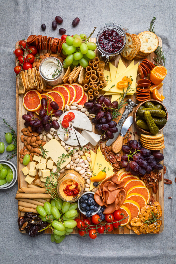 An assortment of food on a vegan charcuterie board.